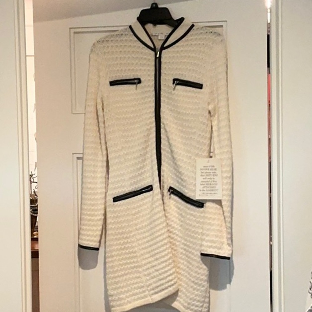 Chic Cream Knit Jacket with Black Trim